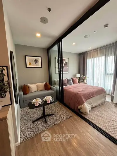 Modern studio apartment with cozy bedroom and stylish living area