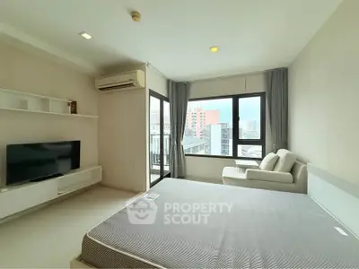 Spacious modern bedroom with city view and minimalist decor