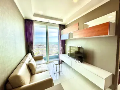 Modern living room with stunning city view and sleek furniture