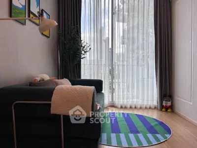 Cozy living room with modern decor and large window view