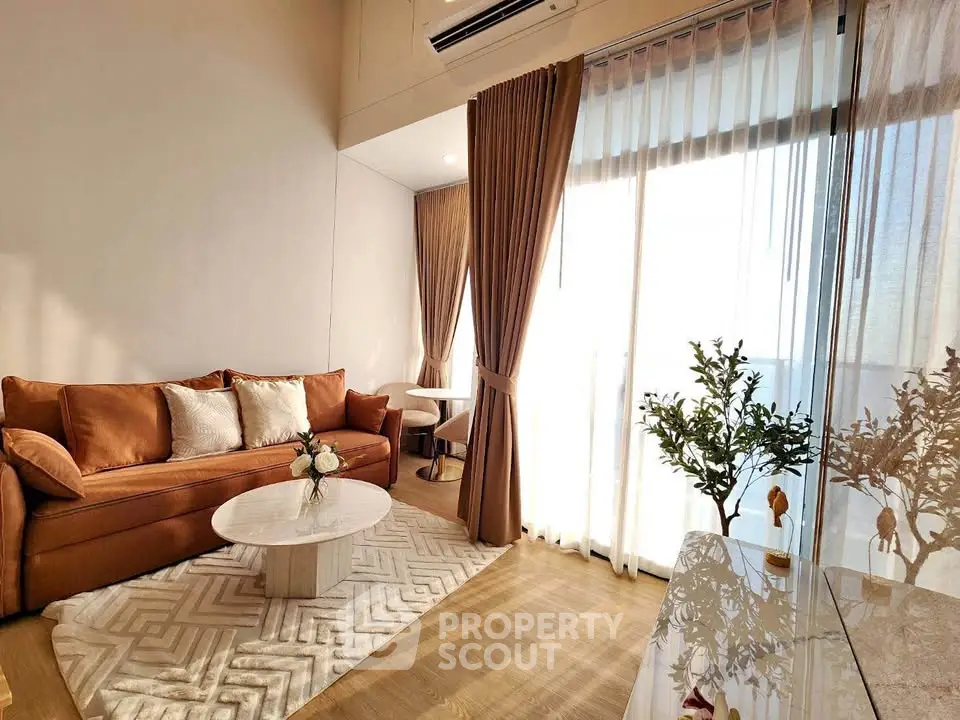 Luxurious living room with elegant decor and abundant natural light