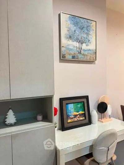 Stylish study area with modern decor and elegant artwork, perfect for productivity and inspiration.