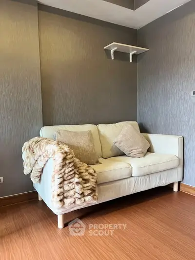 Cozy living room with stylish sofa and elegant decor