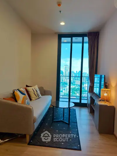 Modern living room with city view and cozy decor