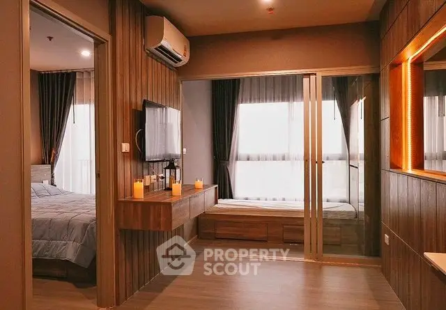 Cozy bedroom with modern decor and ambient lighting, featuring a stylish wooden accent wall and large windows.