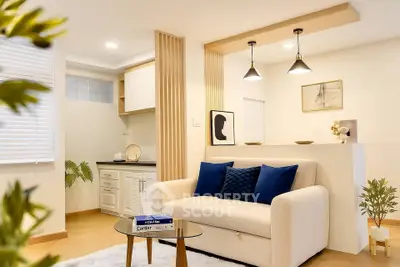 Modern living room with cozy sofa and stylish decor