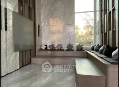 Luxurious modern living room with elegant seating and large windows