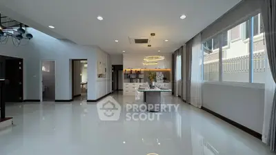 Spacious modern kitchen with sleek design and ample natural light