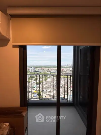 Stunning balcony view overlooking cityscape with expansive horizon.