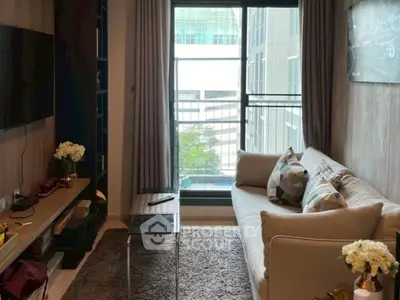 Modern living room with cozy sofa and city view window, perfect for urban living.