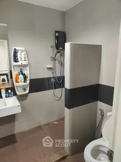 Modern bathroom with shower and sleek tile design