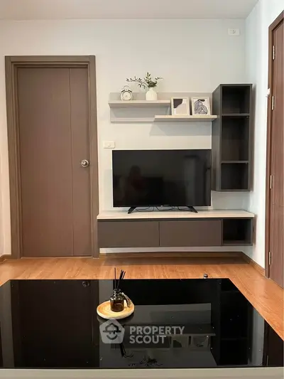 Modern living room with sleek TV unit and stylish decor