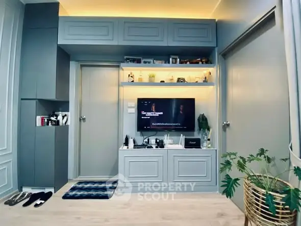 Modern living room with sleek built-in storage and ambient lighting