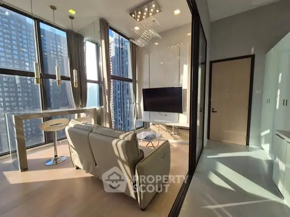 Modern living room with floor-to-ceiling windows and city view