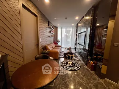 Stylish living room with modern decor and marble flooring, featuring a cozy leather sofa and large TV.