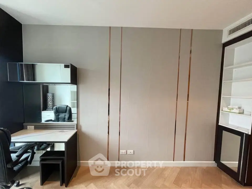 Modern study room with sleek desk and chair, perfect for productivity.