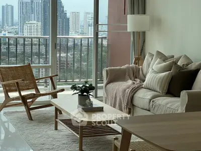 Chic urban living room with plush sofa, stylish wooden furniture, and expansive city view through floor-to-ceiling windows, embodying modern comfort.