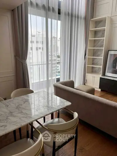 Luxurious living room with marble dining table and city view, perfect for modern urban living.