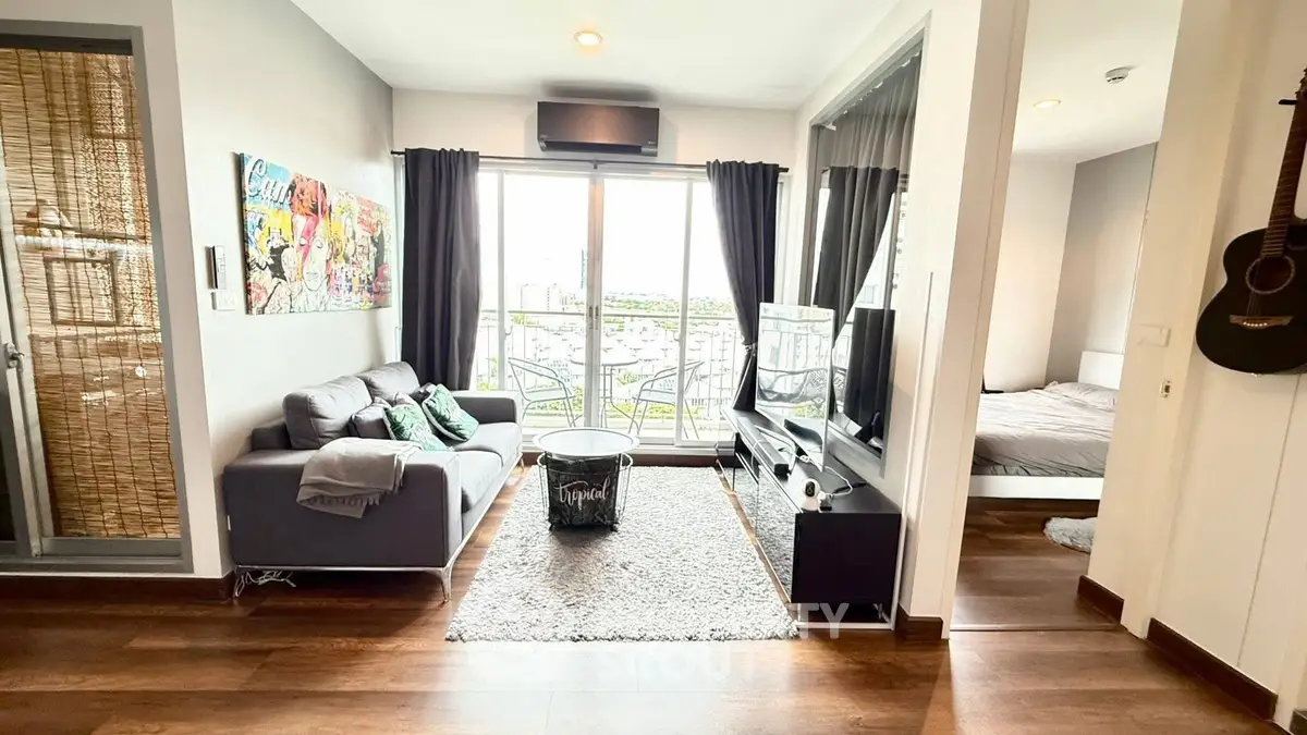 Modern living room with balcony view and stylish decor