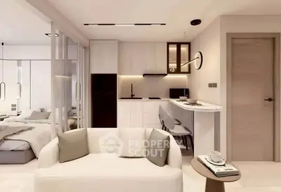 Modern open-plan living room and kitchen with sleek design and neutral tones.