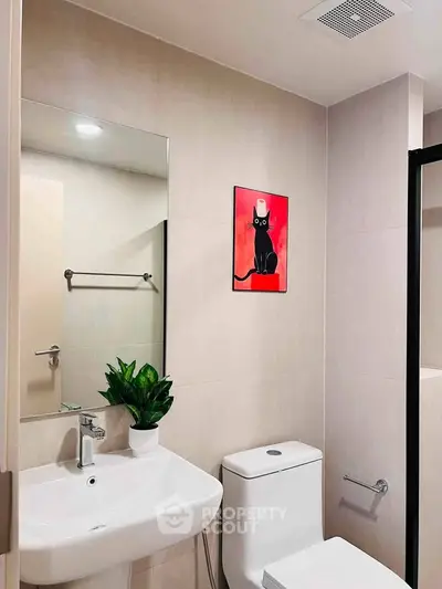 Modern bathroom with sleek fixtures and stylish decor