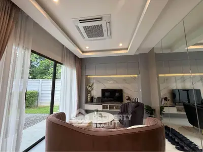 Luxurious living room with modern decor and garden view
