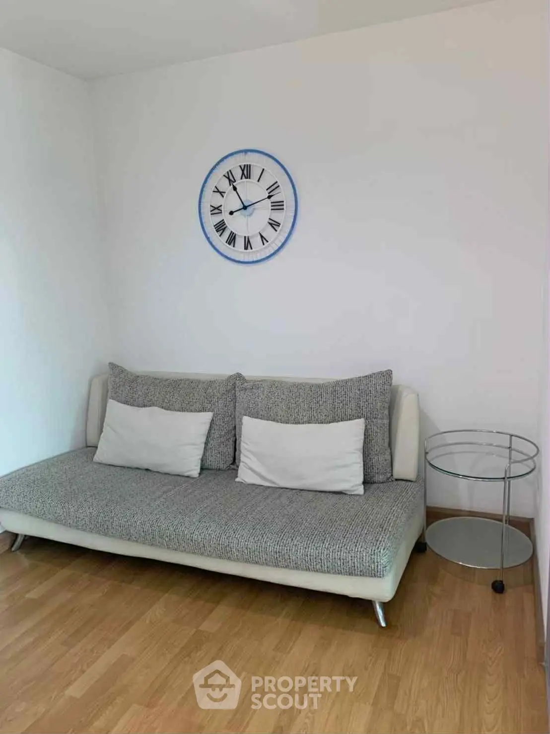 Modern living room with stylish sofa and decorative wall art