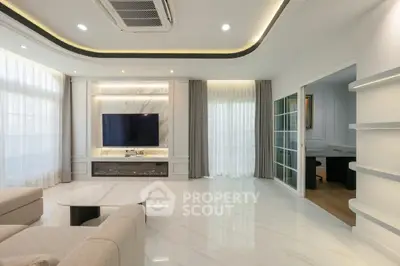 Luxurious modern living room with marble flooring and elegant lighting