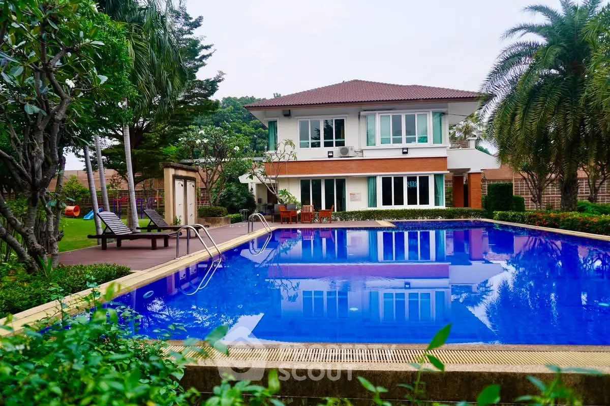 Luxurious villa with private pool and lush garden in serene setting