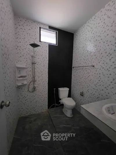Modern bathroom with sleek shower and stylish tile design