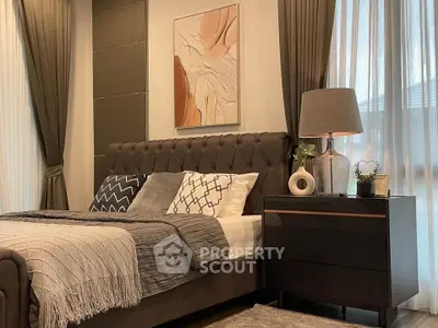 Luxurious bedroom with elegant decor and natural light