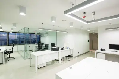 Modern office space with sleek design and ample natural light