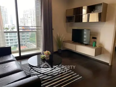 Modern living room with sleek furniture and city view