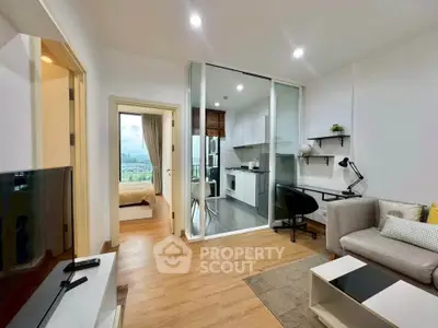 Modern apartment interior with open kitchen and cozy living area