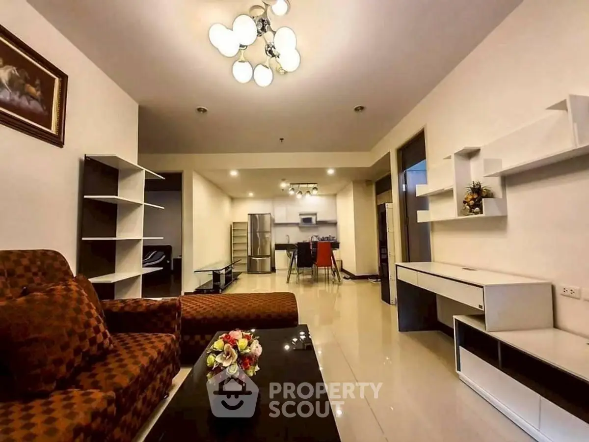 Spacious modern living room with open kitchen and stylish decor