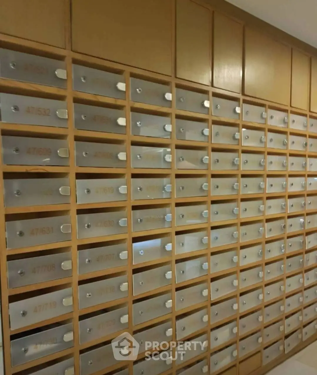 Modern apartment building mailboxes with sleek design and organized layout.