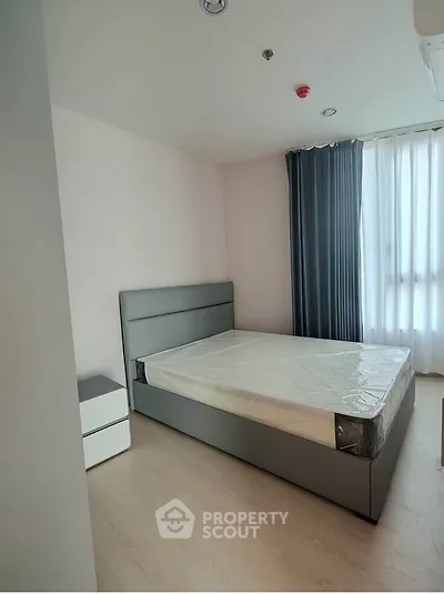 Modern bedroom with minimalist design and natural light