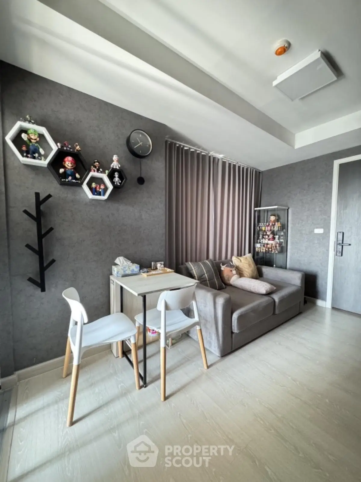 Modern living room with stylish decor and cozy seating area
