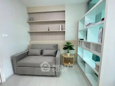 Modern living room with stylish sofa and built-in shelving