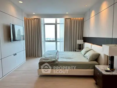 Luxurious modern bedroom with city view and elegant decor