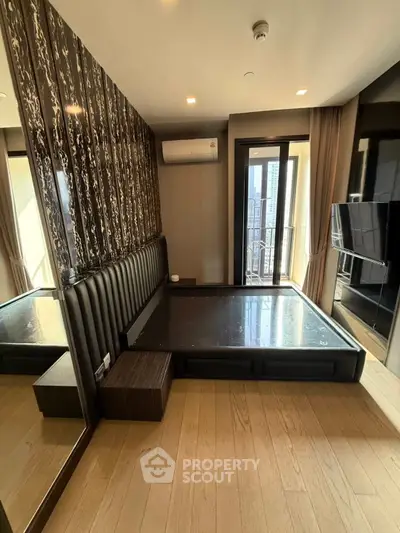 Luxurious bedroom with modern design and city view balcony