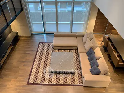 Spacious modern living room with large sectional sofa and stylish decor