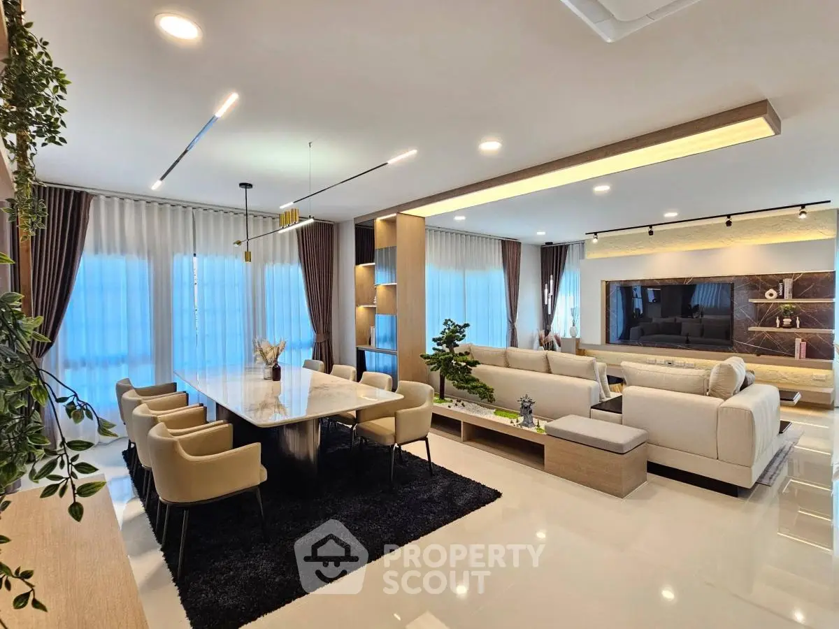 Luxurious modern living room with elegant dining area and stylish decor