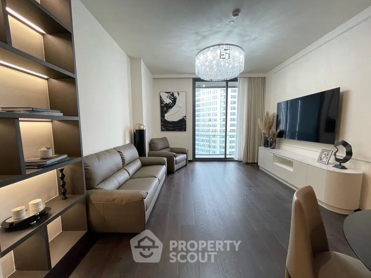 Luxurious modern living room with elegant chandelier and city view