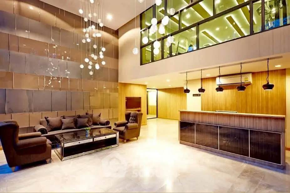 Luxurious modern lobby with elegant lighting and stylish seating area