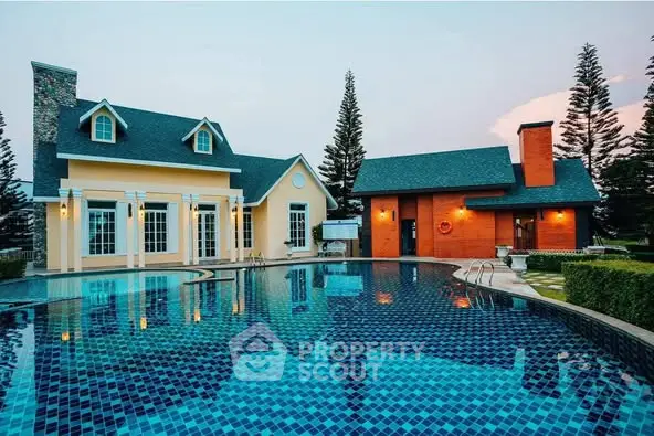 Luxurious property with stunning pool and elegant architecture, perfect for upscale living.