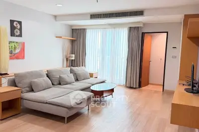 Spacious modern living room with stylish furniture and natural light