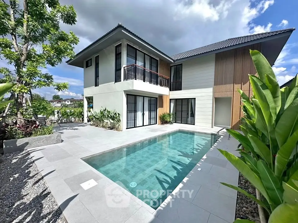 Stunning modern house with private pool and lush greenery, perfect for luxury living.