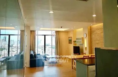 Spacious living room with city view and modern decor