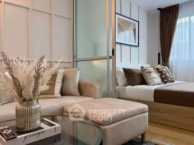 Chic modern studio with cozy living area and stylish bedroom, perfect for urban living.